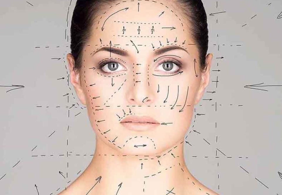 Woman with surgical markings on face