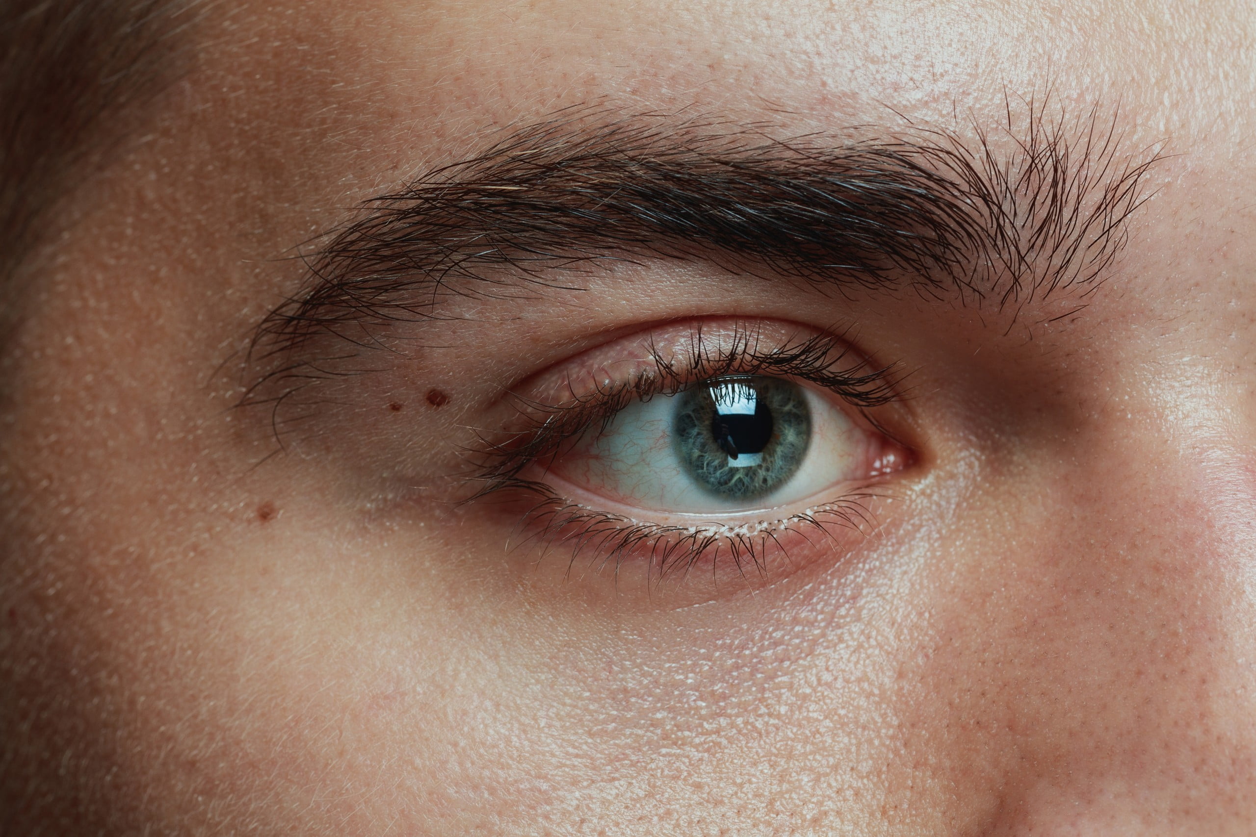 Close-up portrait of young man eye