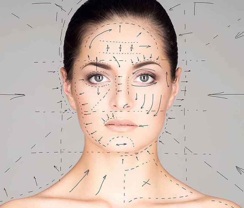 Woman with surgical markings on face