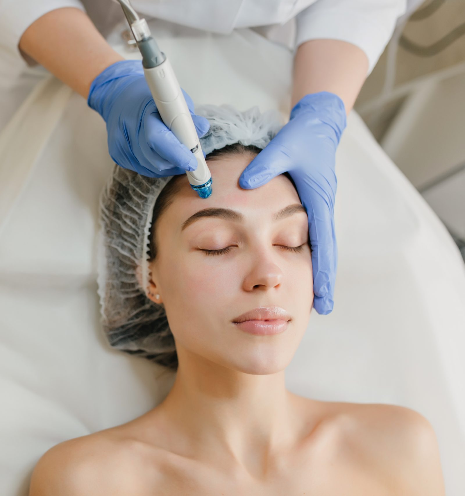 View from above of beautiful woman enjoying mesotherapy procedures, rejuvenation in a aesthetic clinic.